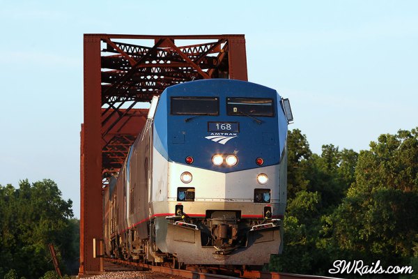 Amtrak P42DC 168 leads train #1 across the Brazos River at Richmond TX